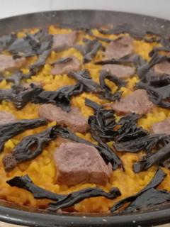 Una foto de Arroz con pato y trompetas de la muerte