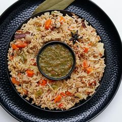 A picture of High Protein Soya chunks Rice with Mix Vegetable.