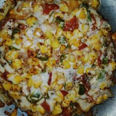A picture of Veg corn pizza.