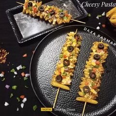 A picture of Cheesy Pasta Sticks.