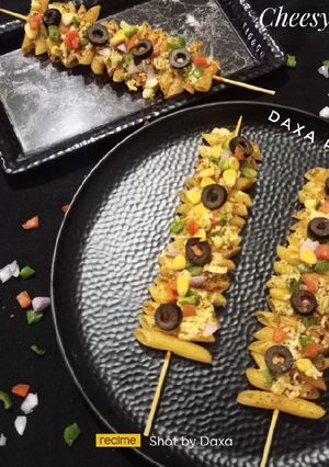 A picture of Cheesy Pasta Sticks.