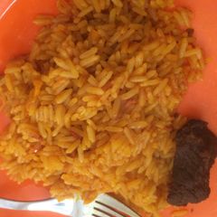 A picture of Palm oil rice.