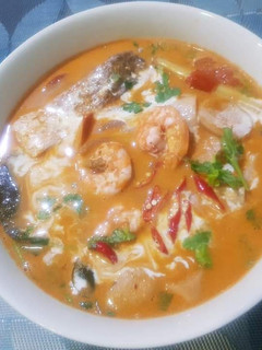 A picture of Tom Yum Kung (Thai Hot and Sour Shrimp Soup).
