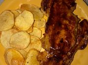 Una foto de carre de cerdo con miel y mostaza