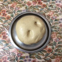 A picture of Soft roti dough in bread maker machine.