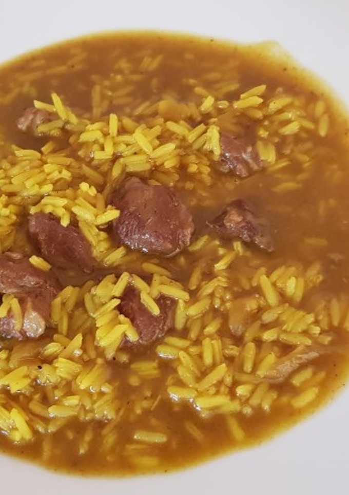 Una foto de Arroz con carrillada