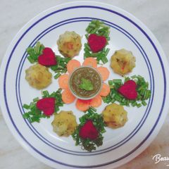 A picture of Steamed Veggie Khichu Modak.