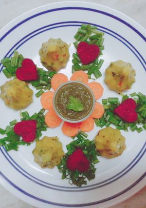 A picture of Steamed Veggie Khichu Modak.