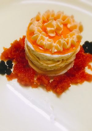 A picture of Steamed layered sandesh with orange mousse.