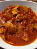 Oreja guisada en salsa de tomate