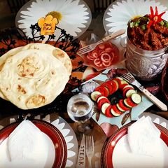 Balti ghosht with homemade Tanduri Roti A picture of Balti ghosht with homemade Tanduri Roti.