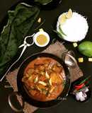 Aam Kasundi Mangsho (Mutton in Raw Mango-Mustard Gravy)