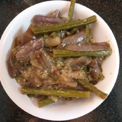 A picture of Drumsticks Brinjal curry.