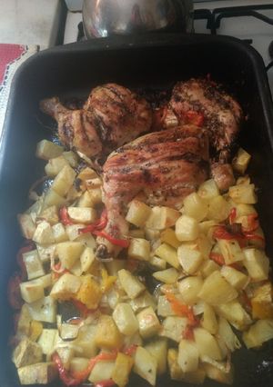 Una foto de Pollo al horno con verduras