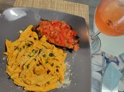 A picture of penne in creamy tomato sauce