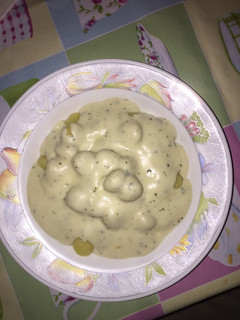 Una foto de Ñoquis con salsa de quesos