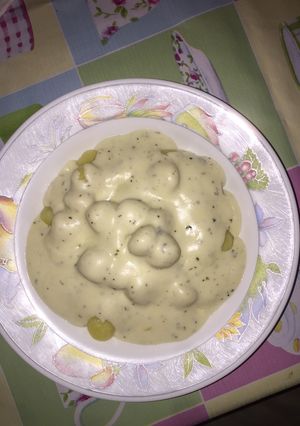 Una foto de Ñoquis con salsa de quesos
