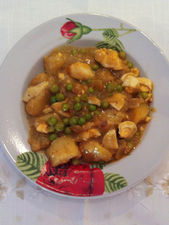 Una foto de Patatas con guisantes
