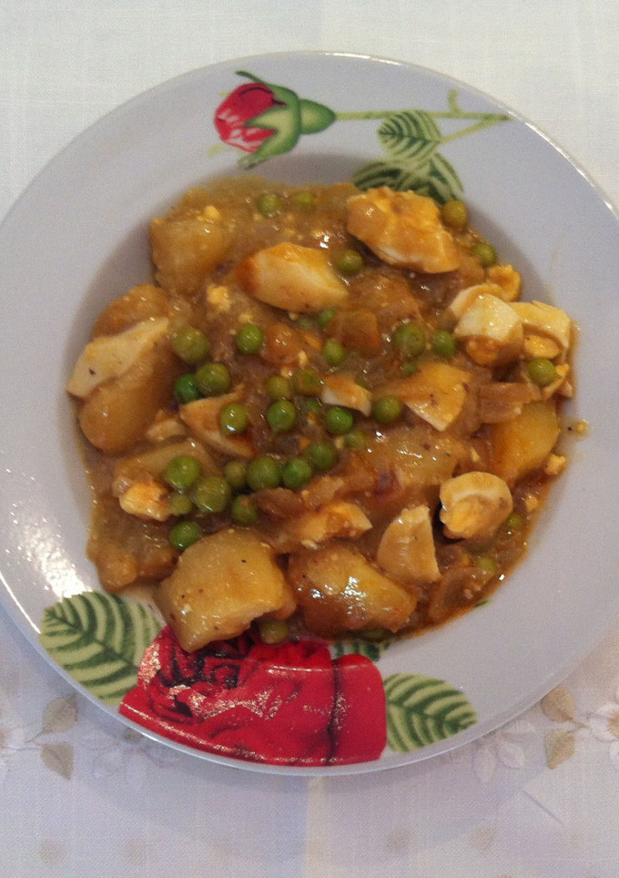 Una foto de Patatas con guisantes