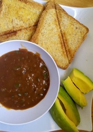 A picture of Oxtail soup and Bread.