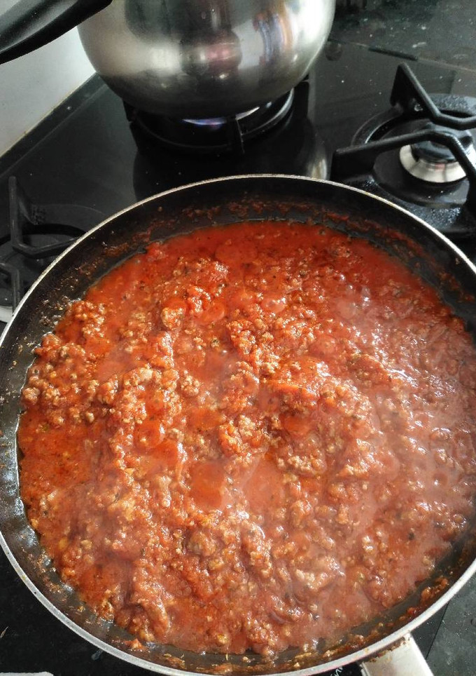 Una foto de Spaguettis a la boloñesa