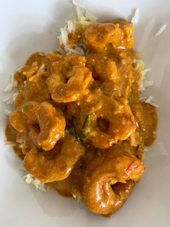 Una foto de Curry de langostinos