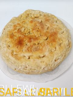 Una foto de Pan tradicional, pero dulce y con toque a mandarina