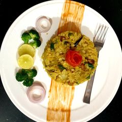 Poha with steamed broccoli A picture of Poha with steamed broccoli.