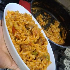 A picture of Pasta in grilled tomato cream sauce.