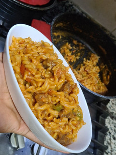 A picture of Pasta in grilled tomato cream sauce.