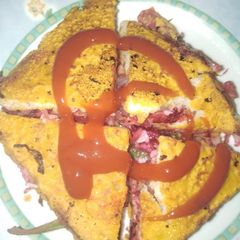 A picture of Beetroot pudla sandwich.