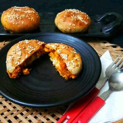 A picture of Stuffed buns with leftover veggies.