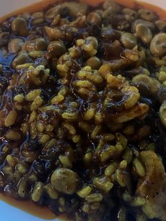 Una foto de Arroz meloso de panceta, morcilla y habitas