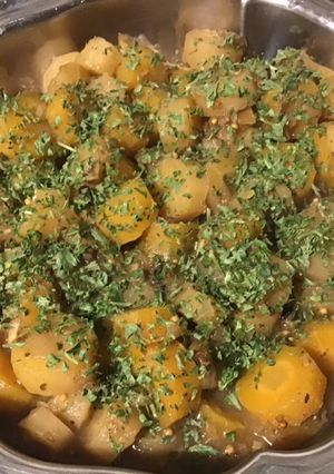 Une photo de Carottes jaunes et blanches au cumin et citron confit