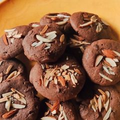 A picture of Eggless chocolate almond cookies.