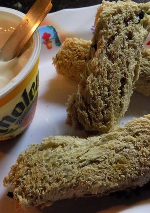 Una foto de Rollitos calentitos de pan lactal con relleno de espinacas
