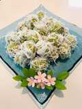 Pandan Coconut Rice Balls (Khanom Tom Bai Toey)
