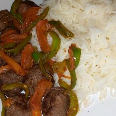 Meatballs with veggies and steamed rice A picture of Meatballs with veggies and steamed rice.