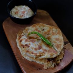 A picture of Amritsari Aloo stuffed Naan.