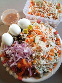 A picture of Beans Dumplings with veg salad.