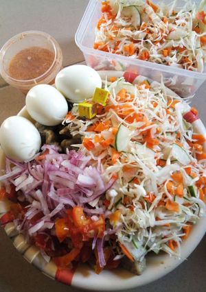 A picture of Beans Dumplings with veg salad.