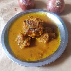 A picture of Gravy With Onion Pokoda.