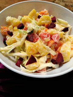 A picture of Potato salad with beetroot.