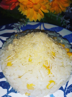 Una foto de Arroz de maíz con queso parmesano