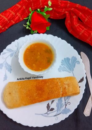 A picture of South Indian Thali (Dosa).
