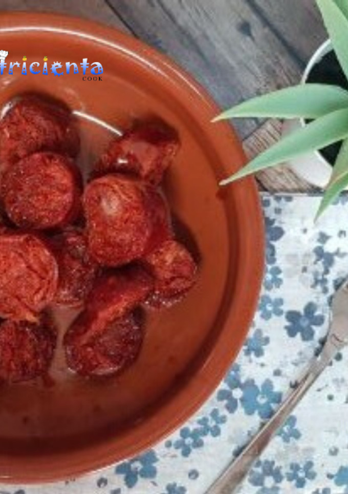 Una foto de Chorizos al vino blanco