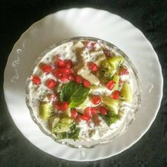 A picture of Bajri and fruits raita.