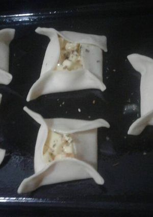 Una foto de Empanadas de Cebolla, Queso y Huevo