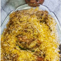 A picture of Achari Chicken Biryani.