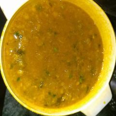 A picture of Lauki Chana Dal with Green chutney.
